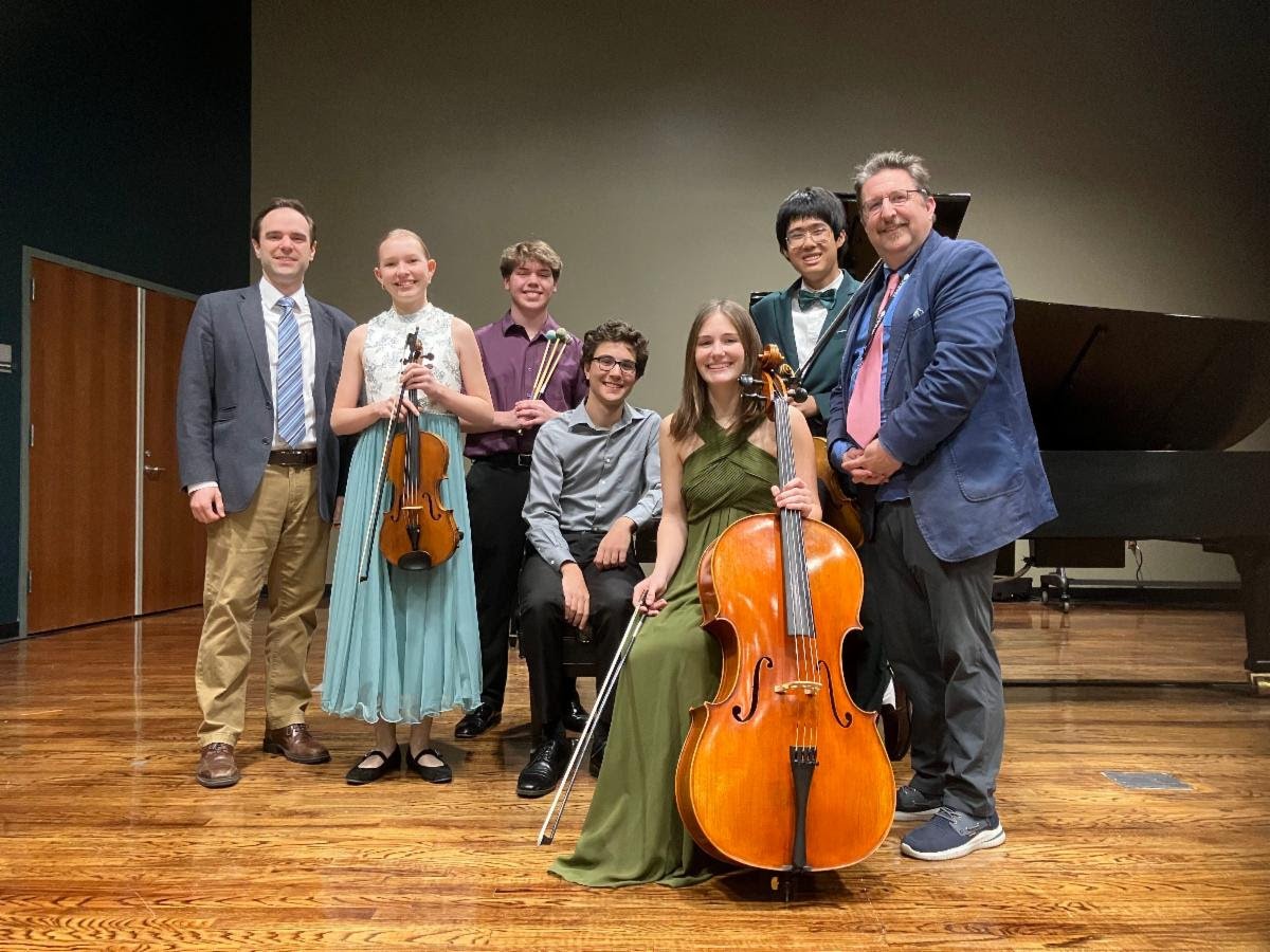 2025 Concerto Competition finalists, from left to right: Sonia Okunev, Dylan Goldbach, Joshua Acree, Madison Shamis, and Jerry Gan (not pictured is Roger Luo). The judges were Dr. Timothy McMurray (left) and Mr. Neil Casey (right).